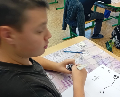 husím brkem namáčeným v inkoustu zkoušeli, jak se psalo